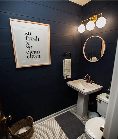 navy blue and gold bathroom